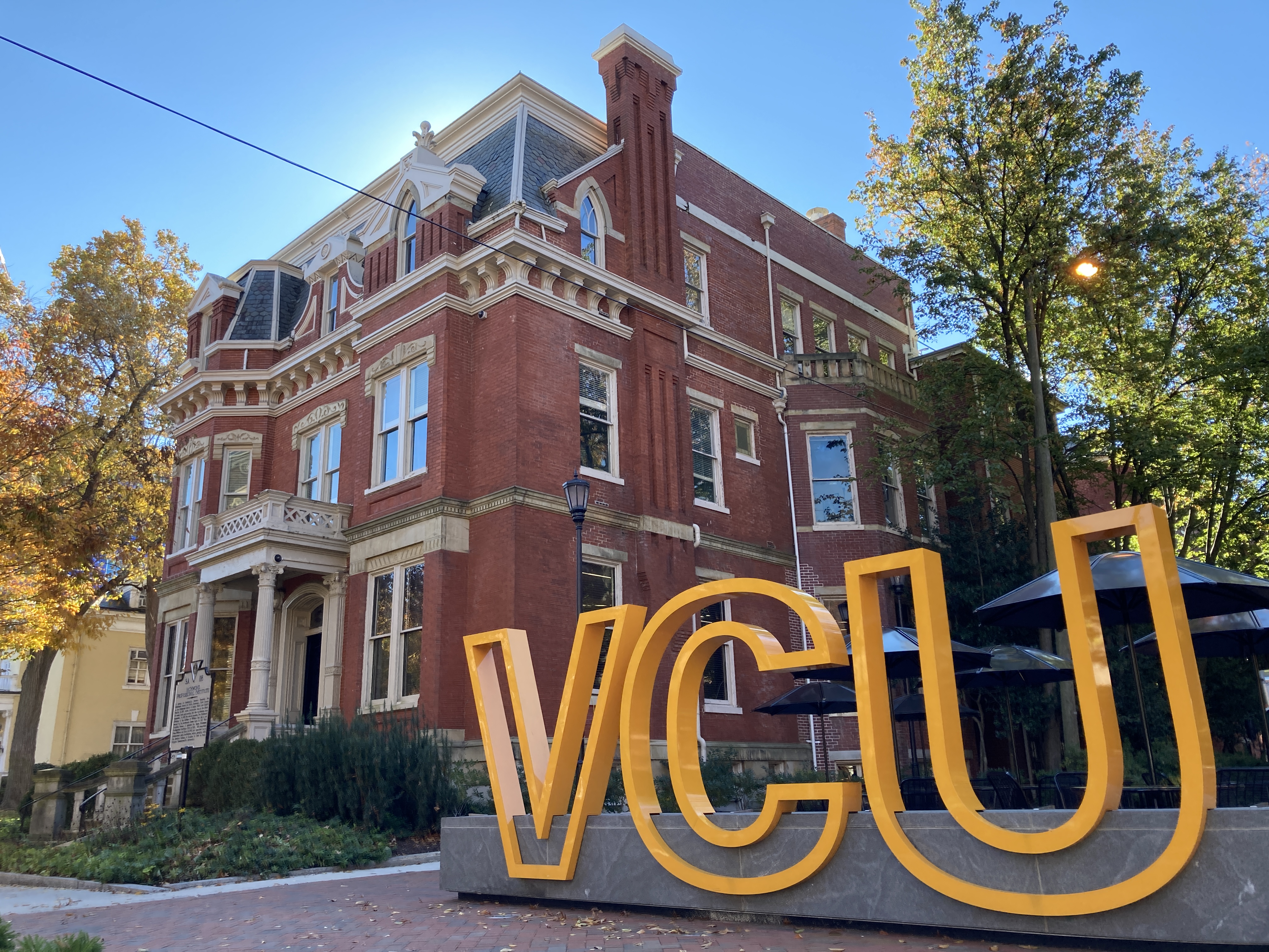 Founders Hall in background and VCU sign in foreground
