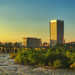 A beautiful sunset picture of the James River and the downtown skyline of Richmond, Virginia